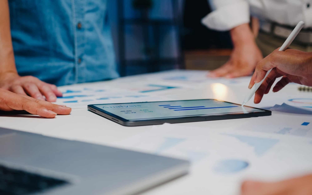 People Looking At Tablet Screen