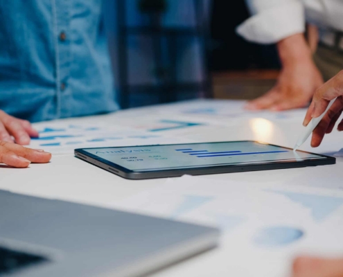 People Looking At Tablet Screen